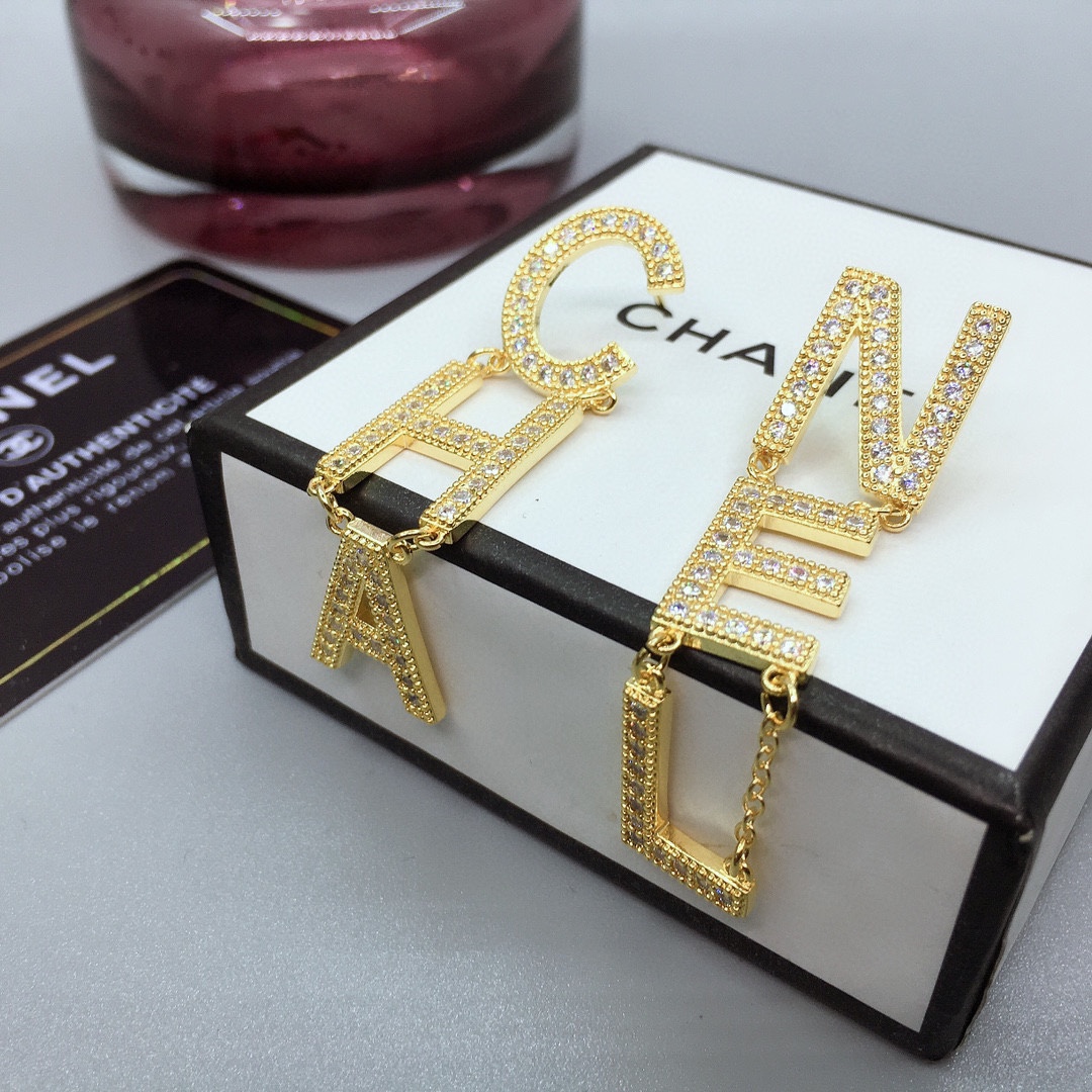 Ch**el The Letter C-H-A N-E-L Frame Earrings Gold Tone For Women