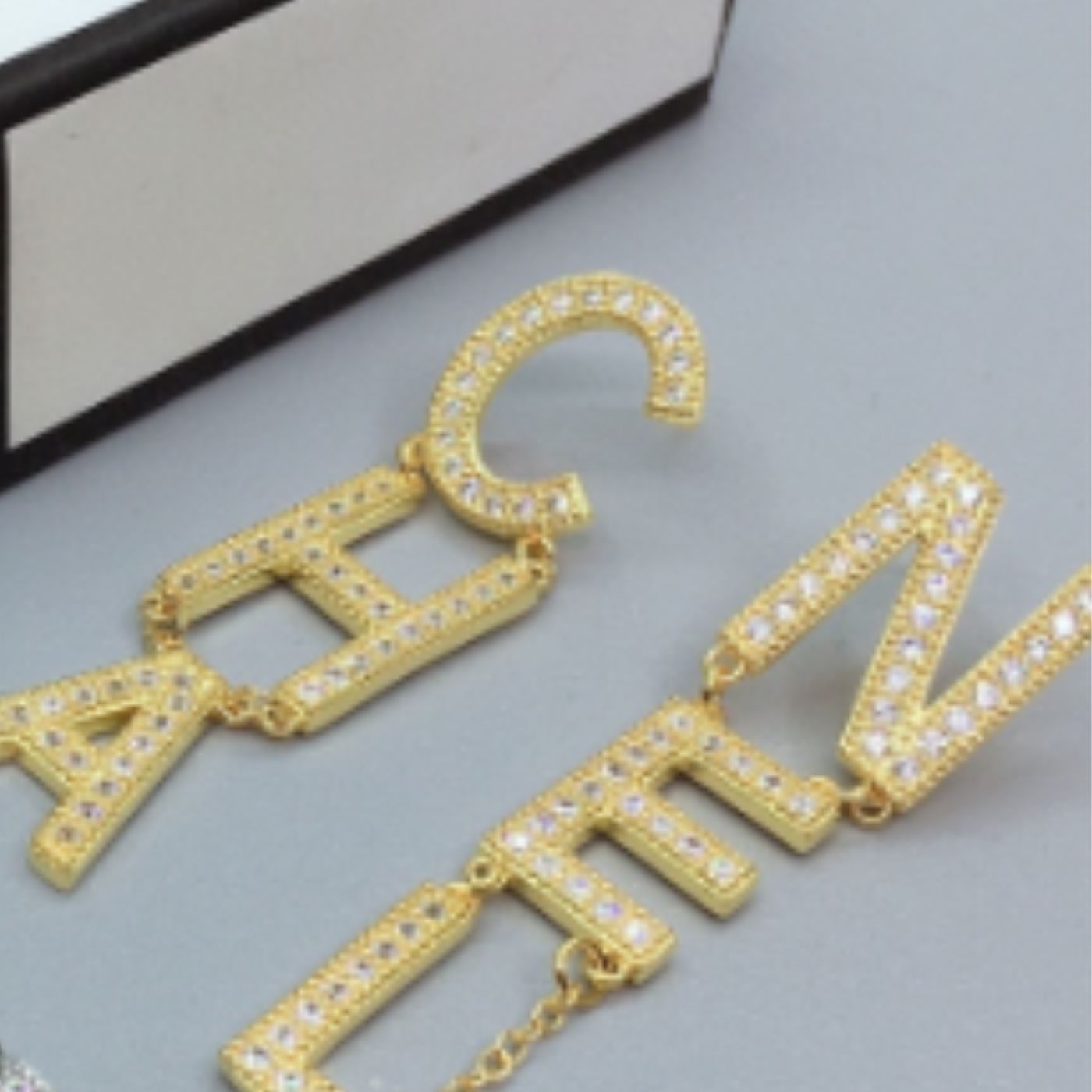 Ch**el The Letter C-H-A N-E-L Frame Earrings Gold Tone For Women