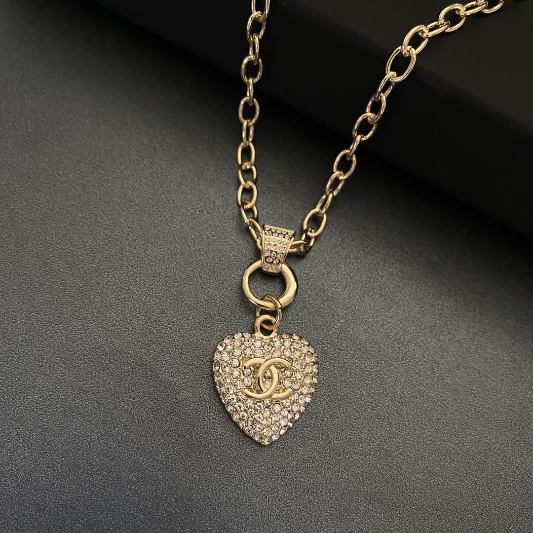 Ch**el Twinkle Heart Chain Necklace Gold Tone For Women