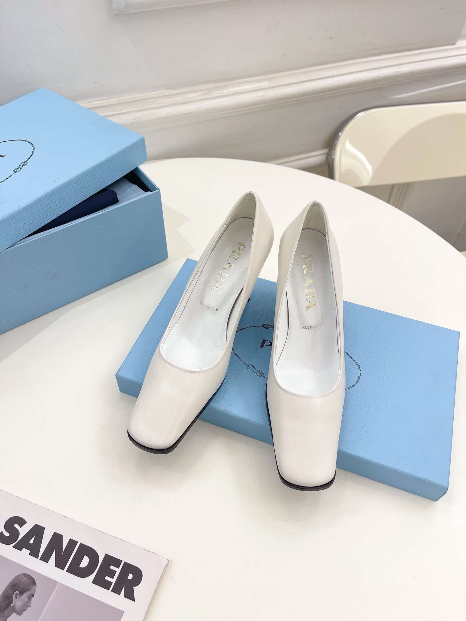 Pra*a Brushed Pumps White For Women