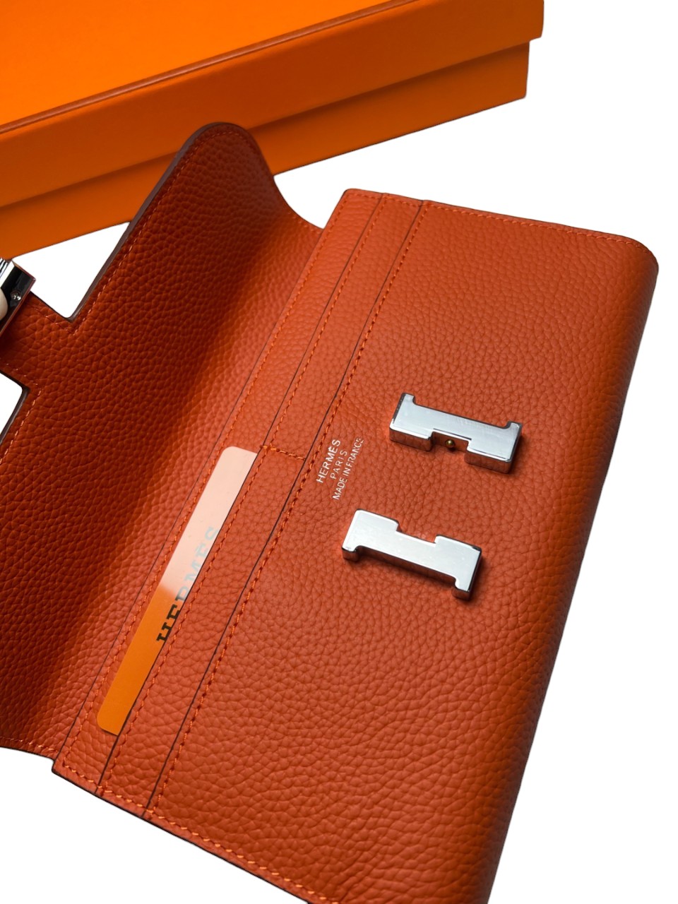 H**me5 Constance Togo Long Wallet 20cm/7.9in Silver Toned Hardware For Women Orange